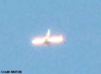 Silent, Glowing Dragonfly-Shaped UFO Photographed Over Asheville, North Carolina.jpg